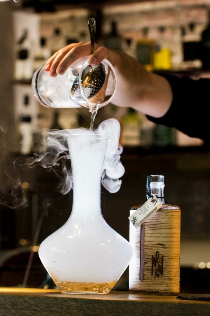 Bartender pouring drink scaled